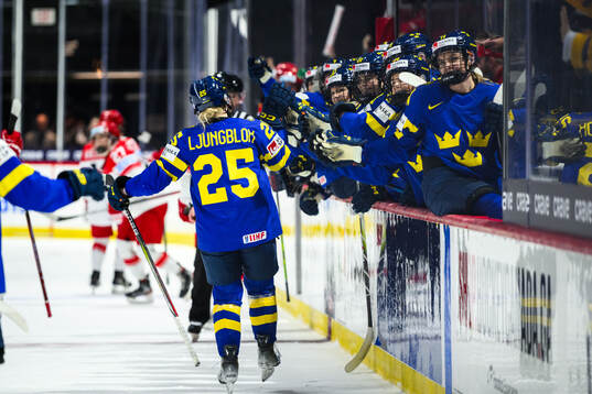 Lina Ljungblom of Sweden celebrates with teammates