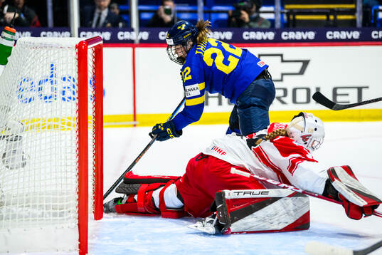 Hanna Thuvik of Sweden and goaltender Emma-Sofie Nordstrom