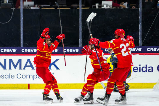 Minghui Kong of China celebrates scoring 7-1