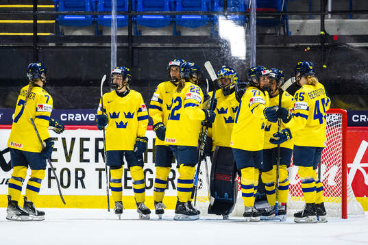 Players of Sweden celebrate