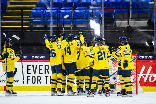 Players of Sweden celebrate
