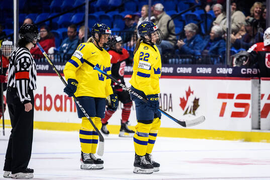 Lova Blom and Hanna Thuvik of Sweden look dejected