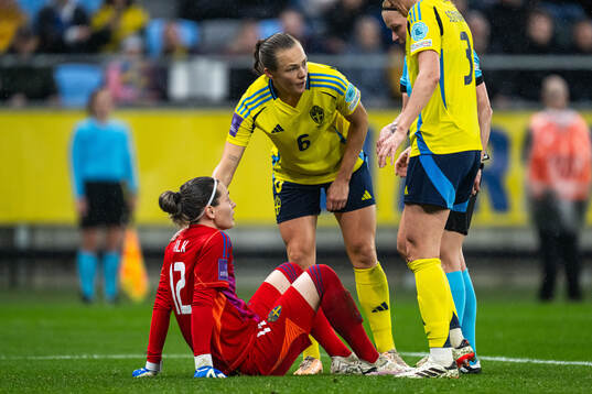 Goalkeeper Jennifer Falk of Sweden in pain
