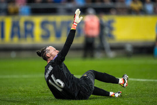 Goalkeeper Pauline Peyraud-Magnin of France in pain