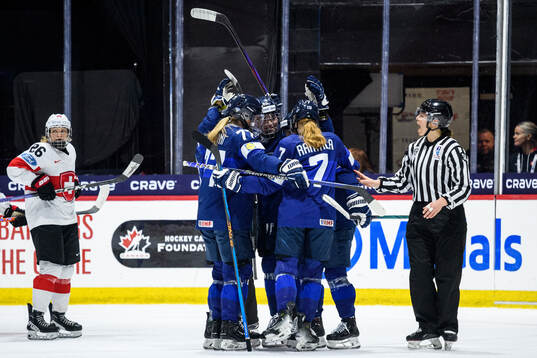 Petra Nieminen of Finland (not in picture) celebrates with