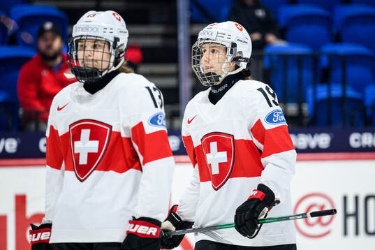 Ivana Wey and Emma Ingold of Switzerland look dejected