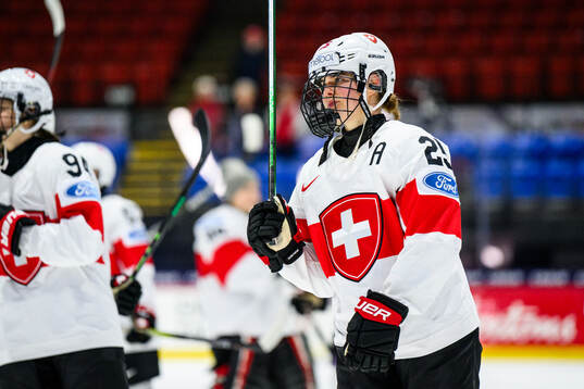 Alina Muller of Switzerland looks dejected