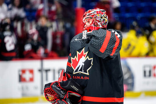 Goaltender Emerance Maschmeyer of Canada
