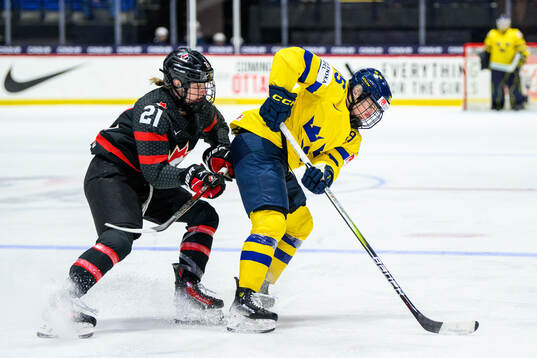 Ashton Bell of Canada and Lina Ljungblom of Sweden