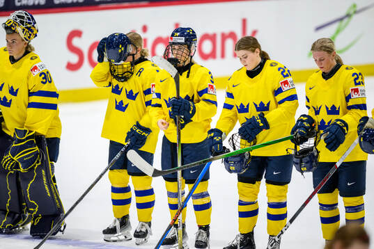 Mira Hallin, Hanna Thuvik and Thea Johansson of Sweden look