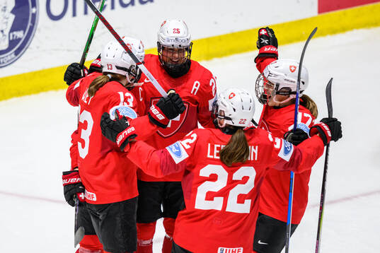 Lara Stalder of Switzerland celebrates with teammates