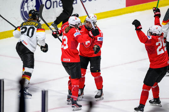 Lara Stalder of Switzerland celebrates with teammates