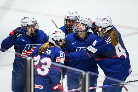 Hannah Bilka of USA celebrates with teammates