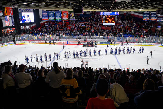 Players of Finland and of USA