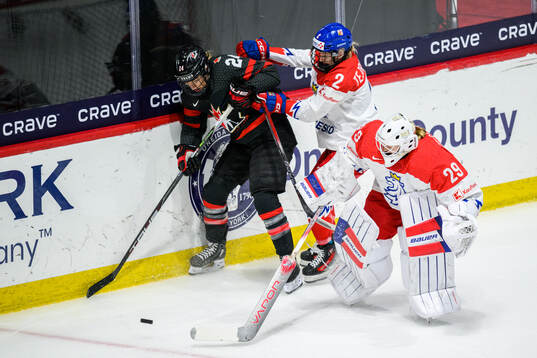 Natalie Spooner of Canada against Aneta Tejralova and
