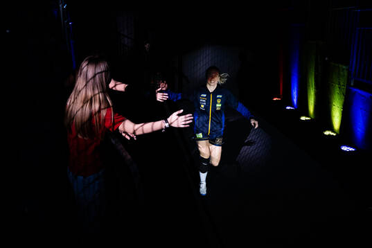 Jenny Carlson of Sweden enters the arena