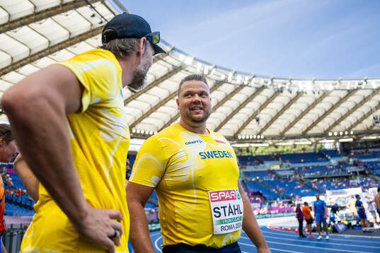 Coach Staffan Jönsson and Daniel Ståhl of Sweden