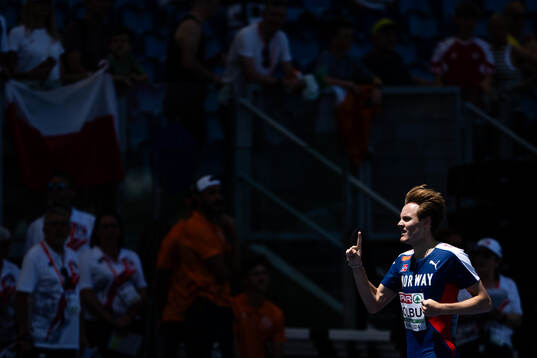 Ole Jakob Solbu of Norway celebrates
