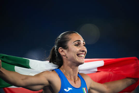 Alice Mangione of Italy celebrates