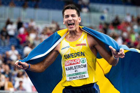 Perseus Karlström of Sweden celebrates
