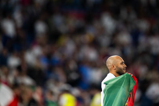Lamont Marcell Jacobs of Italy celebrates