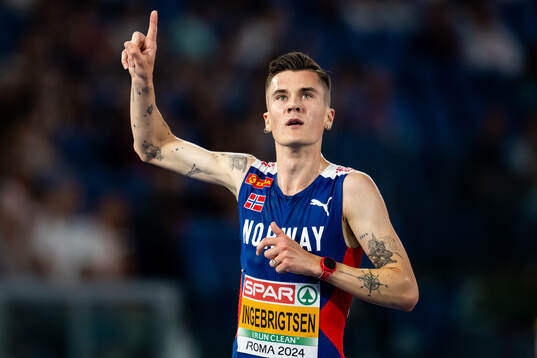 Jakob Ingebrigtsen of Norway celebrates winning men's 5000
