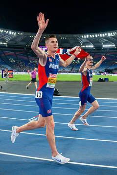 Jakob Ingebrigtsen of Norway celebrates with his brother