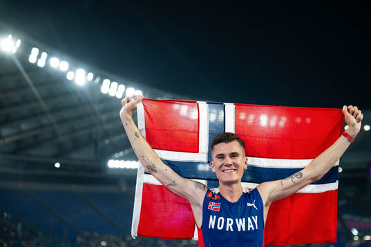 Jakob Ingebrigtsen of Norway celebrates winning men's 5000