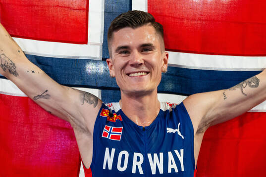 Jakob Ingebrigtsen of Norway celebrates winning men's 5000