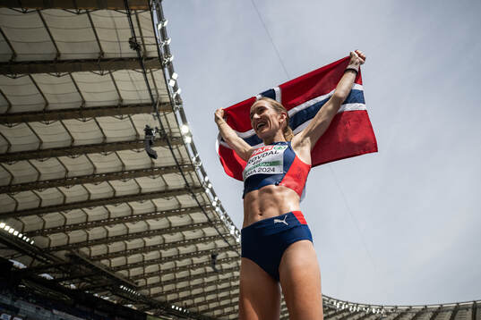 Karoline Bjerkeli Grøvdal of Norway celebrates