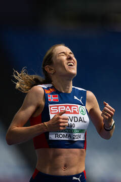 Karoline Bjerkeli Grøvdal of Norway celebrates winning the