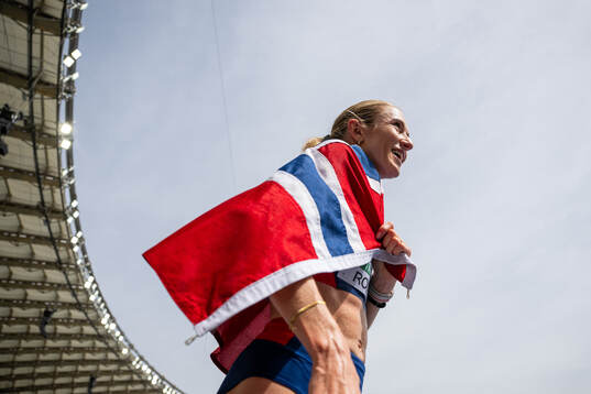 Karoline Bjerkeli Grøvdal of Norway celebrates