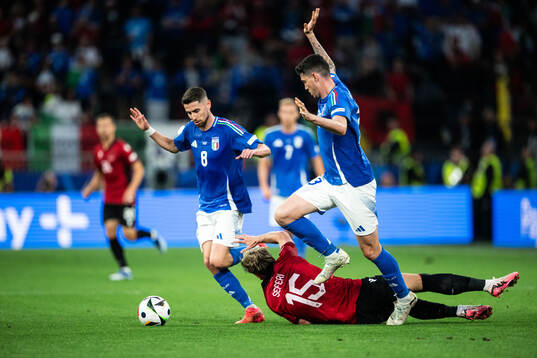 Taulant Seferi of Albania against Jorginho and Alessandro