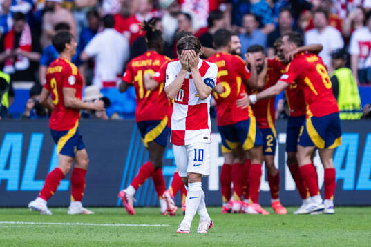 Luka Modric of Croatia looks dejected