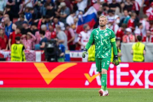 Goalkeeper Kasper Schmeichel of Denmark looks dejected