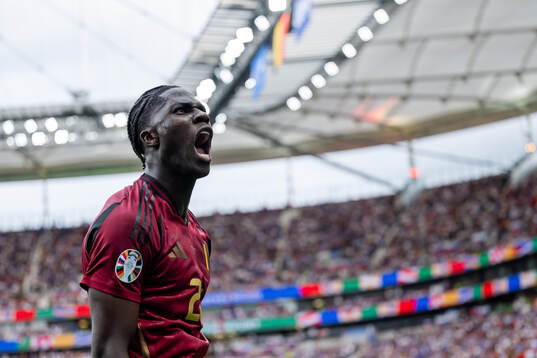 Amadou Onana of Belgium celebrates a goal that was later