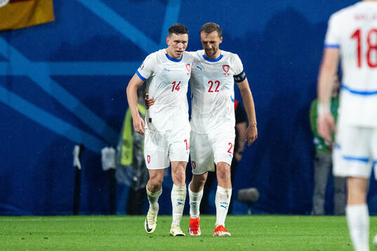Lukas Provod of Czech Republic celebrates with Tomas Soucek