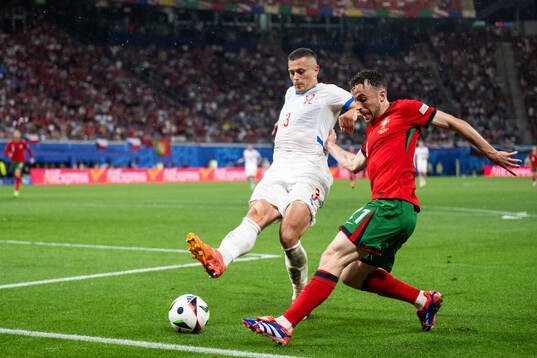 Tomas Holes of Czech Republic and Diogo Jota of Portugal