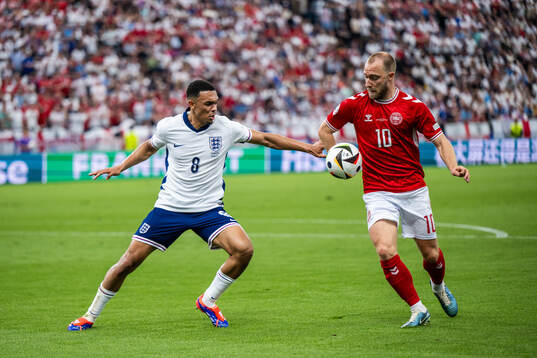 Trent Alexander-Arnold of England and Christian Eriksen of