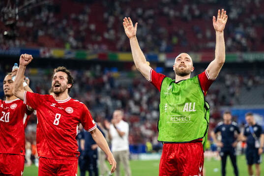 Thomas Delaney and Christian Eriksen of Denmark celebrate