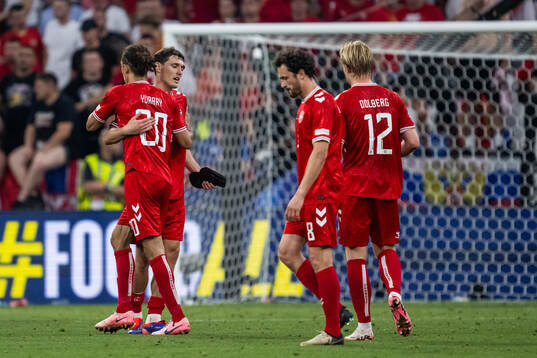 Andreas Kristiansen and Yussuf Poulsen of Denmark celebrate