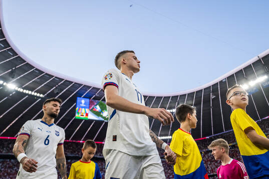 Ivan Ilic of Serbia enters the pitch