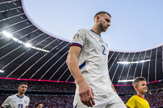Strahinja Pavlovic of Serbia enters the pitch