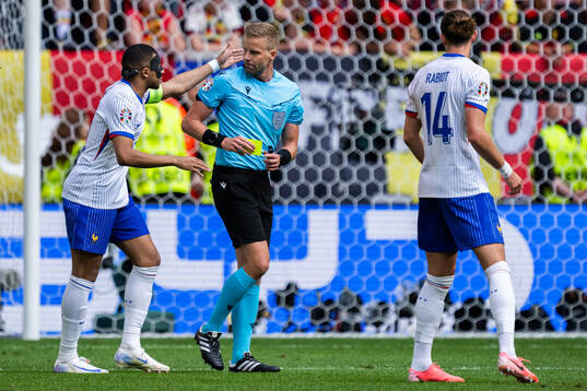 Kylian Mbappé of France reacts