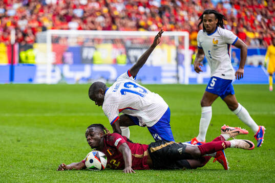 N'Golo Kanté of France and Jeremy Doku of Belgium