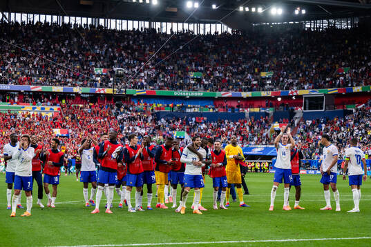 Players of France celebrate