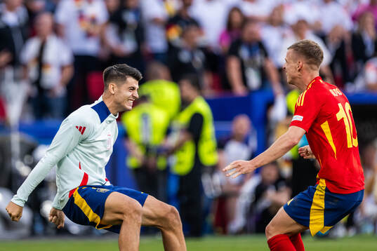 Alvaro Morata and Daniel Olmo of Spain celebrate