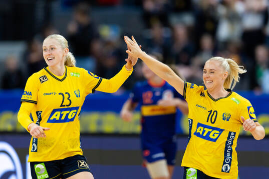 Emma Lindqvist and Mathilda Lundström of Sweden celebrate