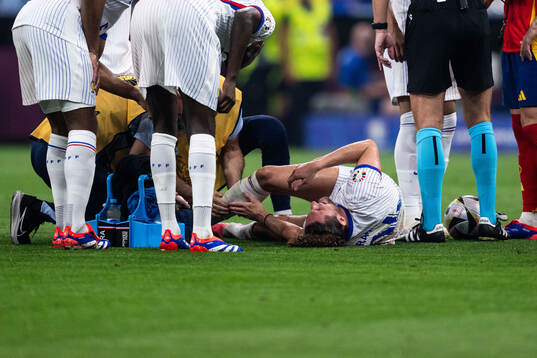 William Saliba of France in pain