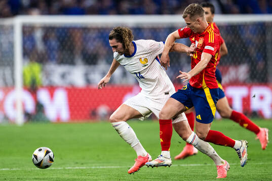 Adrien Rabiot of France and Daniel Olmo of Spain